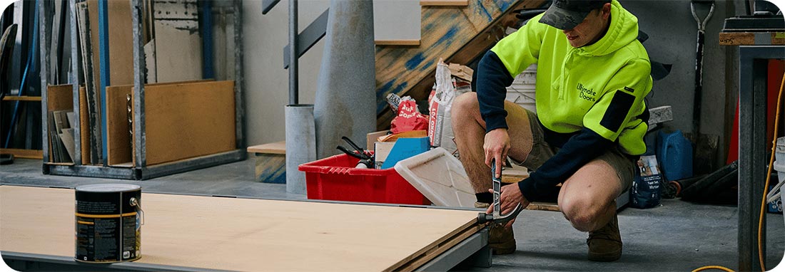 Man fixing door