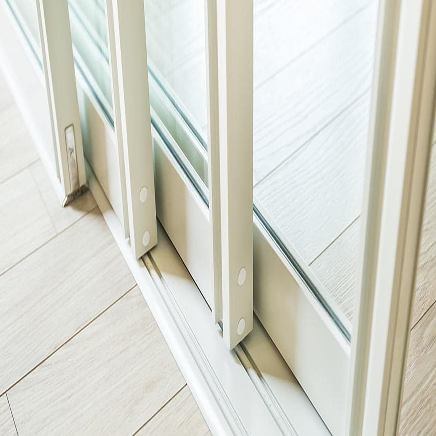 white sliding glass doors close up